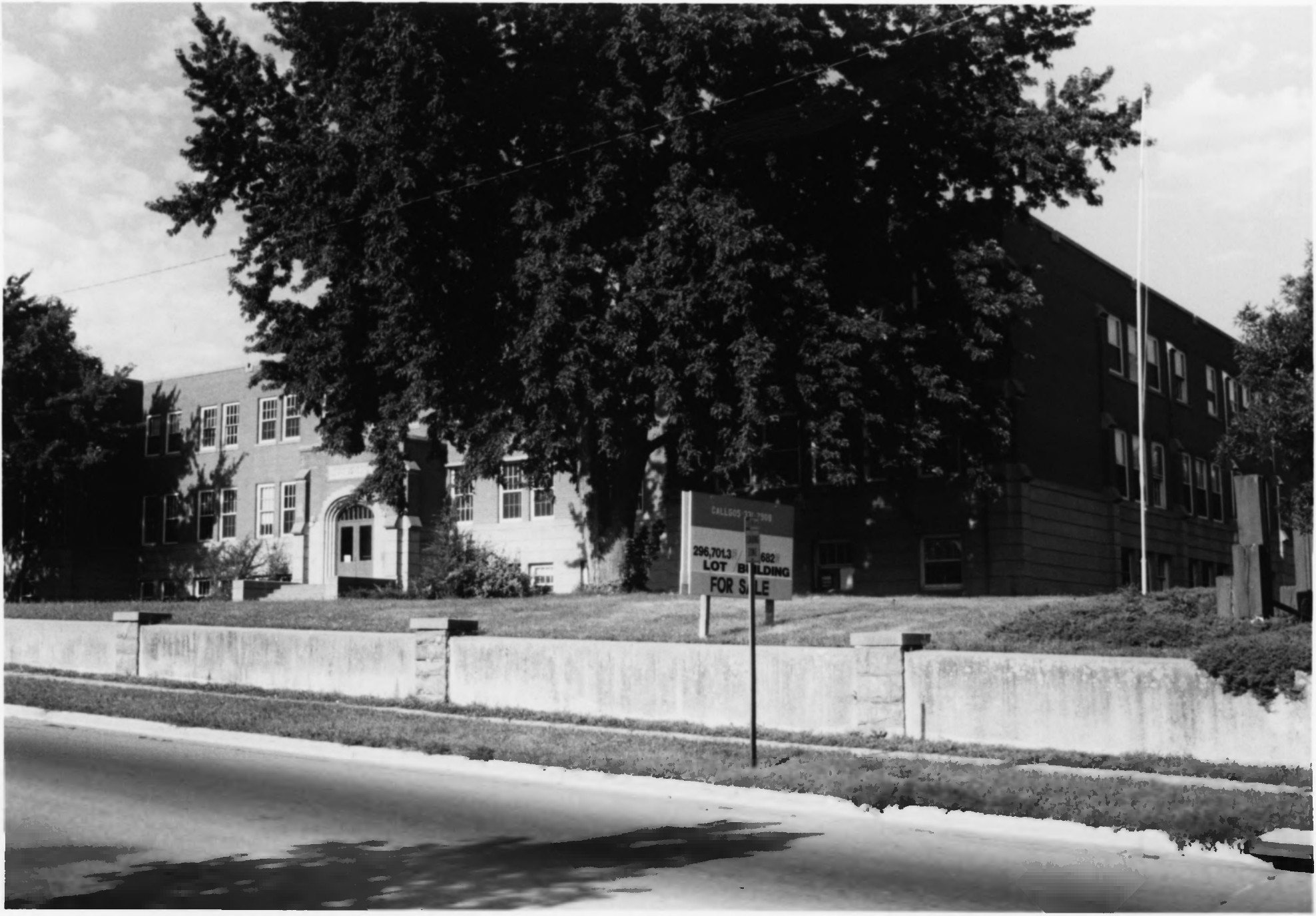 The Presentation Children's Home from Western Avenue in 1992, with a for-sale sign in the yard