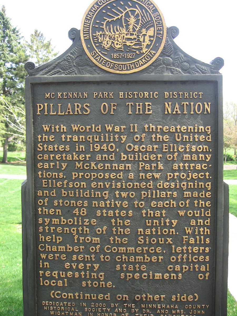 The Pillars of the Nation sign and stone pillars at the park entrance